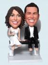 Couple sitting on bench bobblehead