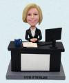 Create Female Business bobbleheads Sitting At Office Desk